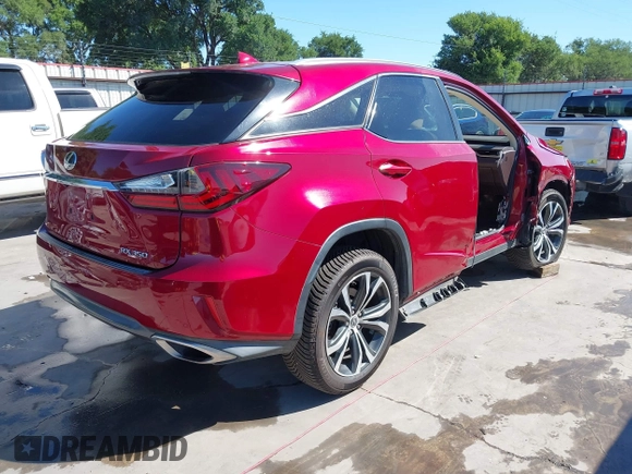 2019 Lexus RX with VIN 2T2ZZMCA5KC120521, listed as a IAAI auction lot 42061246 with 42,697 mi miles. Bid and sale history available at carsss.com. Image 4.