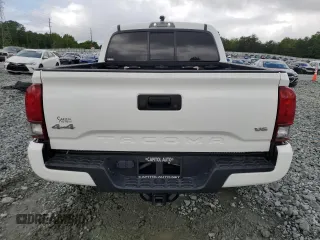 2021 Toyota Tacoma SR с VIN 3TMCZ5AN4MM386662, выставлен на аукционе Copart как лот 56954865 с пробегом 70 623 миль миль и Списание • Salvage title. История ставок и продаж доступна на DreamBid. Изображение 6.