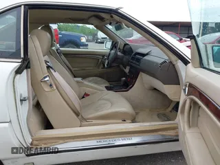 1997 Mercedes-Benz SL 500 z VIN WDBFA63F0VF146394, wystawiony jako IAAI lot #42308697 z przebiegiem 106 935 mil mil oraz . Historia ofert i sprzedaży dostępna na DreamBid. Obrazek 5.