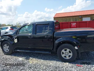 2007 Nissan Frontier Nismo z VIN 1N6AD07W37C447818, wystawiony jako IAAI lot #42156921 z przebiegiem 141 051 mil mil oraz . Historia ofert i sprzedaży dostępna na DreamBid. Obrazek 14.