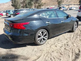 2017 Nissan Maxima SR with VIN 1N4AA6AP4HC406136, listed as a IAAI auction lot 41355573 with 112,111 mi miles. Bid and sale history available at carsss.com. Image 4.