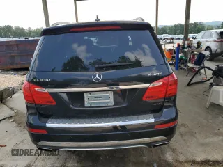 2014 Mercedes-Benz GL 450 z VIN 4JGDF7CE4EA333394, wystawiony jako Copart lot #59158875 z przebiegiem 189 925 mil mil oraz Czysty tytuł • Clean title. Historia ofert i sprzedaży dostępna na DreamBid. Obrazek 6.