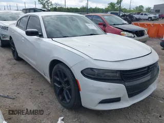 2019 Dodge Charger SXT with VIN 2C3CDXBG6KH670806, listed as a IAAI auction lot 42051415 with 112,144 mi miles and . Bid and sale history available at DreamBid. Image 1.