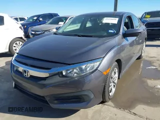 2017 Honda Civic LX z VIN 19XFC2F58HE012626, wystawiony jako IAAI lot #41458898 z przebiegiem 120 354 mil mil oraz . Historia ofert i sprzedaży dostępna na DreamBid. Obrazek 21.