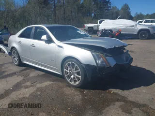 2009 Cadillac CTS-V z VIN 1G6DN57P090167350, wystawiony jako IAAI lot #41820827 z przebiegiem 210 266 mil mil oraz . Historia ofert i sprzedaży dostępna na DreamBid. Obrazek 1.