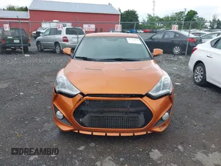 2013 Hyundai Veloster Turbo z VIN KMHTC6AE3DU124744, wystawiony jako IAAI lot #42242242 z przebiegiem 115 757 mil mil oraz . Historia ofert i sprzedaży dostępna na DreamBid. Obrazek 12.