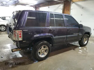 1997 Jeep Grand Cherokee Laredo with VIN 1J4GZ58Y7VC678708, listed as a Copart auction lot 87803725 with 312,585 mi miles and Salvage Title. Bid and sale history available at carsss.com. Image 3.
