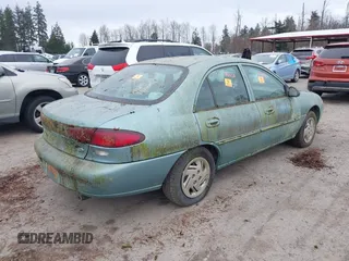1998 Ford Escort SE z VIN 1FAFP13P5WW267120, wystawiony jako IAAI lot #41817184 z przebiegiem 167 299 mil mil oraz . Historia ofert i sprzedaży dostępna na DreamBid. Obrazek 4.