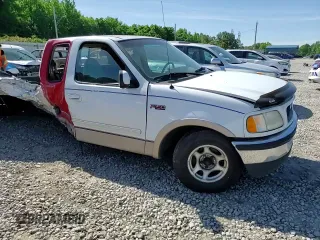 1997 Ford F-150 XL z VIN 1FTEX17L4VNC57714, wystawiony jako Copart lot #57499975 z przebiegiem 84 726 mil mil oraz Szkoda całkowita • Salvage title. Historia ofert i sprzedaży dostępna na DreamBid. Obrazek 13.
