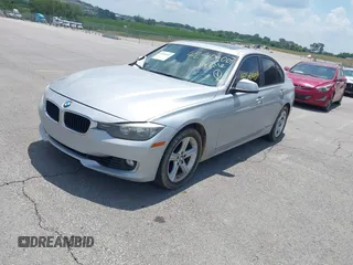 2013 BMW 3 Series 328i with VIN WBA3C1G5XDNR45054, listed as a IAAI auction lot 42504007 with 152,705 mi miles and . Bid and sale history available at DreamBid. Image 2.