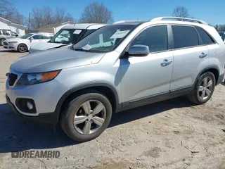 2013 Kia Sorento EX with VIN 5XYKU4A24DG390573, listed as a IAAI auction lot 41628998 with 137,145 mi miles and . Bid and sale history available at carsss.com. Image 2.