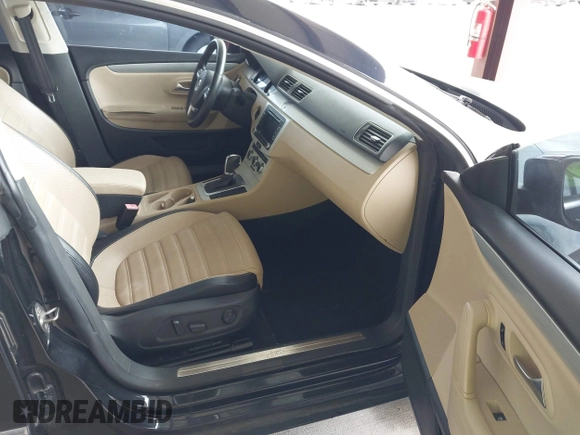 2013 Volkswagen CC Sport with VIN WVWBP7AN1DE506856, listed as a IAAI auction lot 42111392 with 172,706 mi miles. Bid and sale history available at carsss.com. Image 5.
