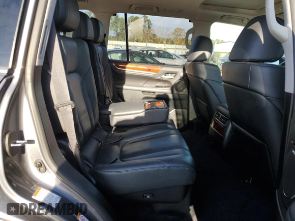 2017 Lexus LX 570 with VIN JTJHY7AX3H4228219, listed as a Copart auction lot 84943634 with 94,413 mi miles and Salvage title. Bid and sale history available at DreamBid. Image 12.