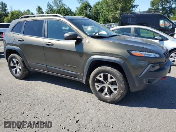 2015 Jeep Cherokee Trailhawk with VIN 1C4PJMBS8FW513391, listed as a Copart auction lot 64633115 with 115,406 mi miles and Clean title. Bid and sale history available at DreamBid. Image 4.