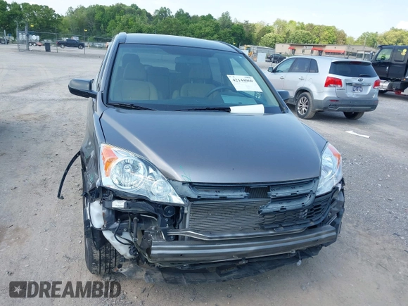 2011 Honda CR-V SE with VIN 5J6RE4H43BL089811, listed as a IAAI auction lot 42144060 with 212,559 mi miles and . Bid and sale history available at carsss.com. Image 12.