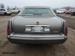 1999 Cadillac DeVille with VIN 1G6KD54Y5XU790380, listed as a Copart auction lot 86062494 with 77,092 mi miles and Clean Title. Bid and sale history available at carsss.com. Image 6.