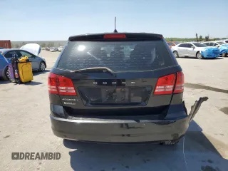 2013 Dodge Journey American Value with VIN 3C4PDCAB6DT709996, listed as a Copart auction lot 52362635 with 104,808 mi miles and Salvage Title. Bid and sale history available at DreamBid. Image 6.