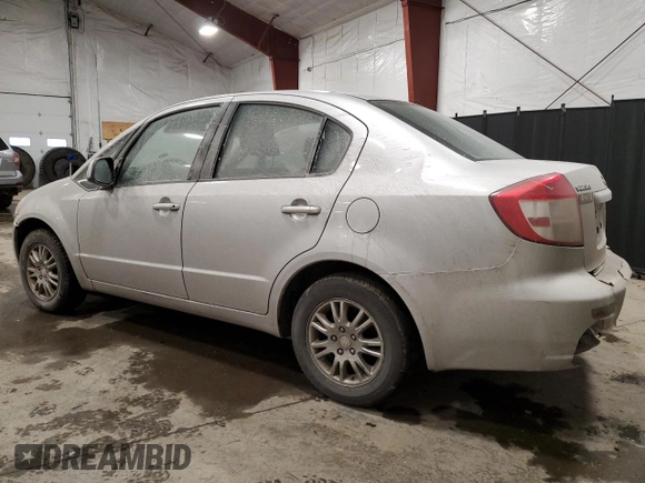 2012 Suzuki SX4 LE with VIN JS2YC5A38C6302014, listed as a Copart auction lot 47006645 with 176,113 mi miles and Salvage Title. Bid and sale history available at DreamBid. Image 2.