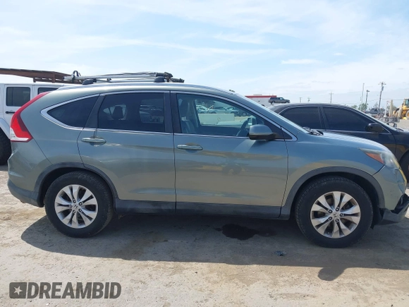 2012 Honda CR-V EX-L with VIN JHLRM3H74CC003987, listed as a IAAI auction lot 42046672 with 143,277 mi miles. Bid and sale history available at carsss.com. Image 13.