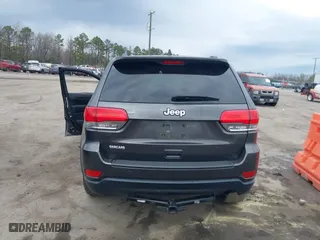 2014 Jeep Grand Cherokee Laredo with VIN 1C4RJEAG1EC573704, listed as a IAAI auction lot 41864355 with 141,970 mi miles. Bid and sale history available at carsss.com. Image 17.