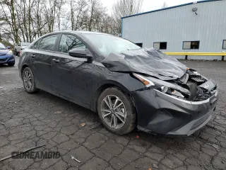 2023 Kia Forte LXS with VIN 3KPF24AD3PE622770, listed as a Copart auction lot 87000344 with 32,898 mi miles and Salvage Title. Bid and sale history available at carsss.com. Image 4.
