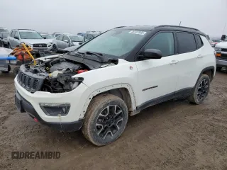 2021 Jeep Compass Trailhawk with VIN 3C4NJDDB5MT590369, listed as a Copart auction lot 46107685 with 67,857 mi miles and Salvage title. Bid and sale history available at DreamBid. Image 1.