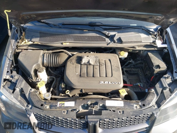 2017 Dodge Grand Caravan GT with VIN 2C4RDGEG9HR825482, listed as a IAAI auction lot 41719213 with 130,456 mi miles and . Bid and sale history available at DreamBid. Image 10.