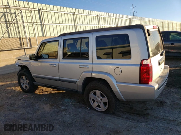 2008 Jeep Commander Sport z VIN 1J8HH48KX8C105432, wystawiony jako Copart lot #86000854 z przebiegiem 201 869 mil mil oraz Szkoda całkowita • Salvage title. Historia ofert i sprzedaży dostępna na DreamBid. Obrazek 2.