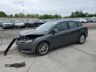 2016 Ford Focus SE with VIN 1FADP3F21GL332194, listed as a Copart auction lot 58063745 with 115,257 mi miles and Salvage title. Bid and sale history available at DreamBid. Image 1.