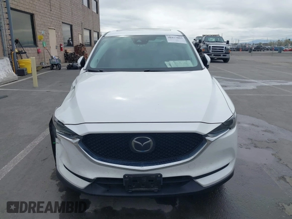 2018 Mazda CX-5 Grand Touring with VIN JM3KFADM1J0309995, listed as a IAAI auction lot 41977003 with 75,303 mi miles. Bid and sale history available at carsss.com. Image 13.
