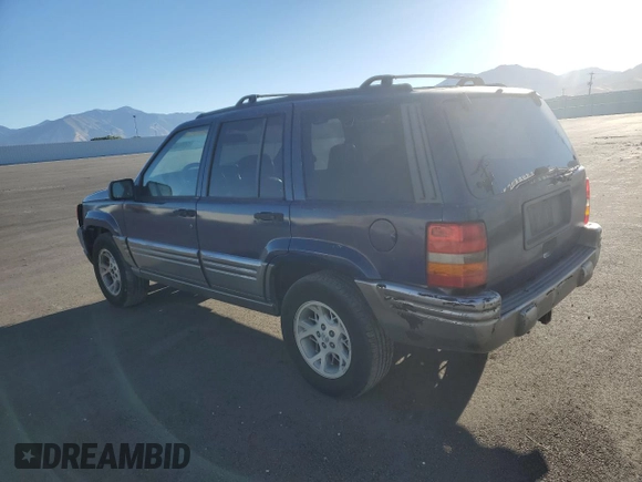 1997 Jeep Grand Cherokee Limited with VIN 1J4GZ78Y8VC737860, listed as a Copart auction lot 72981354 with 292,652 mi miles and Salvage Title. Bid and sale history available at carsss.com. Image 2.