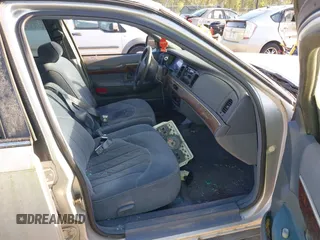 1997 Mercury Grand Marquis GS z VIN 2MELM74W6VX625065, wystawiony jako IAAI lot #42055672 z przebiegiem 125 494 mil mil oraz . Historia ofert i sprzedaży dostępna na DreamBid. Obrazek 5.