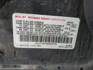 2010 Mitsubishi Outlander XLS with VIN JA4JT4AX4AZ009743, listed as a Copart auction lot 52824925 with 117,984 mi miles and Clean Title. Bid and sale history available at carsss.com. Image 13.