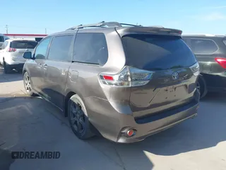 2015 Toyota Sienna SE with VIN 5TDXK3DC3FS684448, listed as a IAAI auction lot 42629958 with 125,645 mi miles and . Bid and sale history available at DreamBid. Image 3.