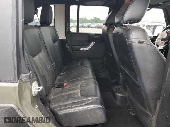 2015 Jeep Wrangler Unlimited Rubicon Hard Rock z VIN 1C4HJWFG8FL681796, wystawiony jako Copart lot #56391915 z przebiegiem 74 529 mil mil oraz Szkoda całkowita • Salvage title. Historia ofert i sprzedaży dostępna na DreamBid. Obrazek 10.