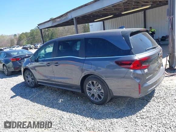 2025 Honda Odyssey Touring z VIN 5FNRL6H84SB028769, wystawiony jako IAAI lot #41856080 z przebiegiem Nie podano mil oraz . Historia ofert i sprzedaży dostępna na DreamBid. Obrazek 13.