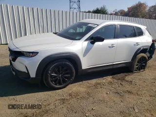 2024 Mazda CX-50 S Preferred with VIN 7MMVABBM6RN200511, listed as a Copart auction lot 77151384 with 7,455 mi miles and Salvage Title. Bid and sale history available at DreamBid. Image 1.