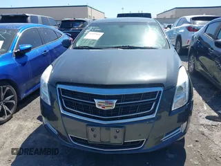 2016 Cadillac XTS Luxury Collection with VIN 2G61N5S32G9208717, listed as a IAAI auction lot 41197011 with 63,545 mi miles and . Bid and sale history available at carsss.com. Image 12.