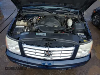 2006 Cadillac Escalade z VIN 1GYEK63N66R127117, wystawiony jako IAAI lot #41570716 z przebiegiem 126 637 mil mil oraz . Historia ofert i sprzedaży dostępna na DreamBid. Obrazek 10.
