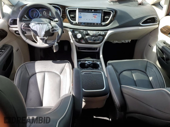 2023 Chrysler Pacifica Limited with VIN 2C4RC3GG9PR605377, listed as a Copart auction lot 51781805 with 7,606 mi miles and Salvage title. Bid and sale history available at DreamBid. Image 8.