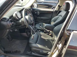 2021 MINI Hardtop 4 Door Cooper S с VIN WMWXU9C06M2N01629, выставлен на аукционе Copart как лот 65398605 с пробегом 74 356 миль миль и Списание • Salvage title. История ставок и продаж доступна на DreamBid. Изображение 7.