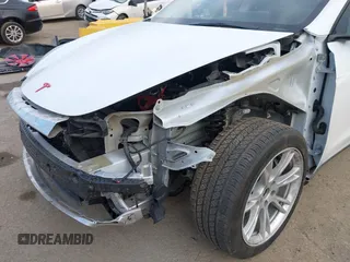 2021 Tesla Model Y Long Range with VIN 5YJYGDEE0MF209045, listed as a IAAI auction lot 41762738 with 24,721 mi miles. Bid and sale history available at carsss.com. Image 6.