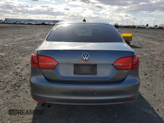 2014 Volkswagen Jetta TDI w/Premium with VIN 3VW3L7AJ4EM273755, listed as a Copart auction lot 52389795 with 184,586 mi miles and Salvage title. Bid and sale history available at DreamBid. Image 6.