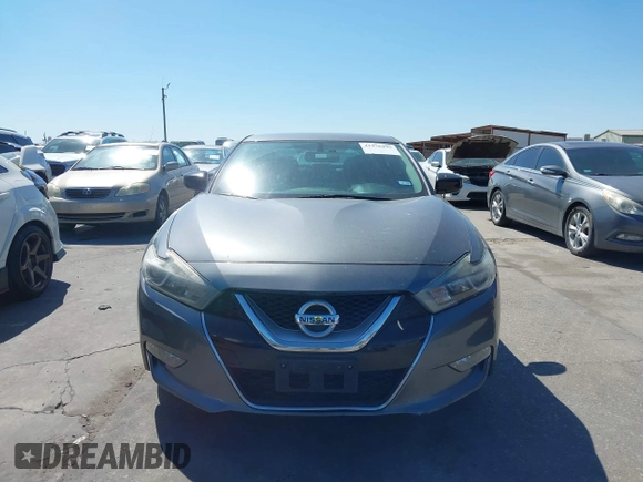 2016 Nissan Maxima SR with VIN 1N4AA6AP9GC414943, listed as a IAAI auction lot 41976295 with 154,738 mi miles and . Bid and sale history available at DreamBid. Image 13.