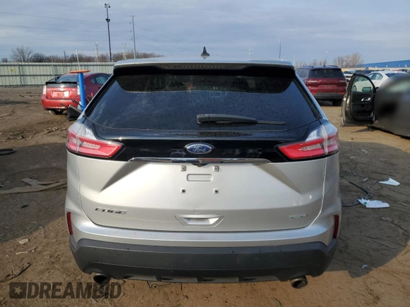 2019 Ford Edge SE z VIN 2FMPK4G93KBB48502, wystawiony jako Copart lot #50984265 z przebiegiem 87 076 mil mil oraz Czysty tytuł • Clean title. Historia ofert i sprzedaży dostępna na DreamBid. Obrazek 6.