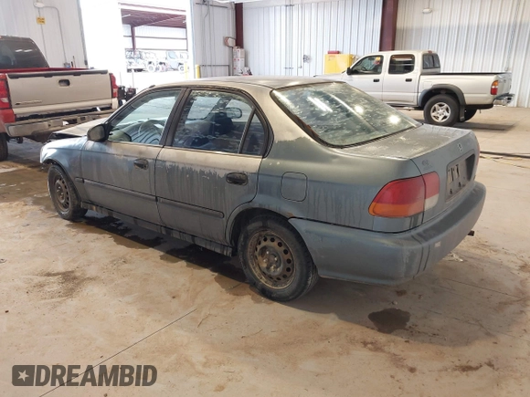 1998 Honda Civic DX with VIN JHMEJ6622WS000401, listed as a IAAI auction lot 41588057 with 296,638 mi miles. Bid and sale history available at carsss.com. Image 3.
