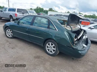 2001 Toyota Avalon XL z VIN 4T1BF28B11U168387, wystawiony jako IAAI lot #42186182 z przebiegiem 129 935 mil mil oraz . Historia ofert i sprzedaży dostępna na DreamBid. Obrazek 3.