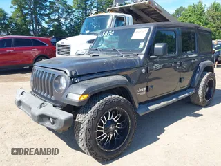 2018 Jeep Wrangler Unlimited Sport S с VIN 1C4HJXDN6JW277829, выставлен на аукционе IAAI как лот 42607187 с пробегом 107 461 миль миль и . История ставок и продаж доступна на DreamBid. Изображение 2.