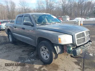 2006 Dodge Dakota SLT with VIN 1D7HW48K16S561521, listed as a IAAI auction lot 41427703 with 201,509 mi miles. Bid and sale history available at carsss.com. Image 1.