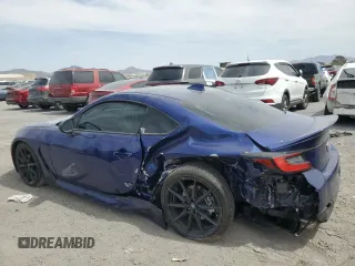 2024 Toyota 86 Premium z VIN JF1ZNBE16R8756183, wystawiony jako Copart lot #52332415 z przebiegiem 6310 mil mil oraz Szkody całkowita. Historia ofert i sprzedaży dostępna na DreamBid. Obrazek 2.